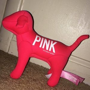 PINK stuffed decorative dog .